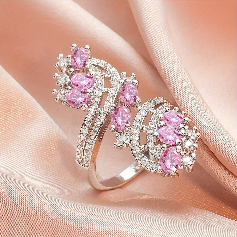 Anello importante dorato con cristallo rosa