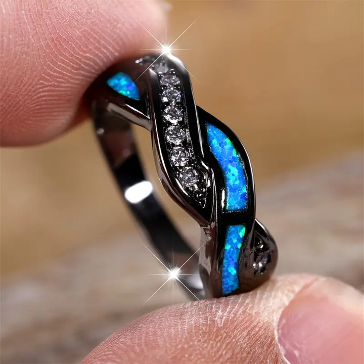 Anello con zaffiro nero e blu | Oro bianco