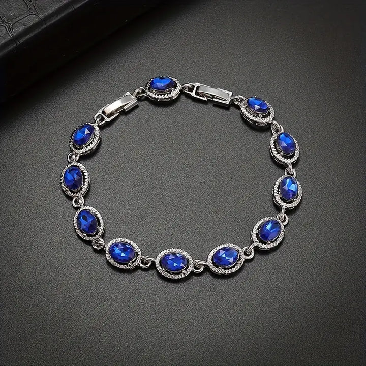 Bracciale rotondo con zaffiro | Oro bianco