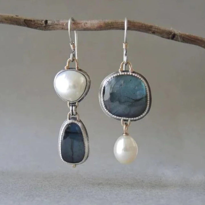 Orecchini con pietra blu