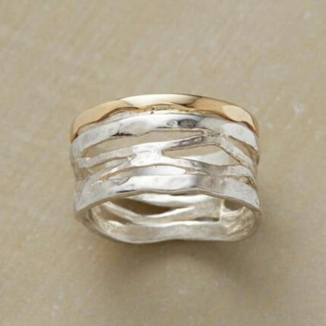 Anello vuoto oro e argento