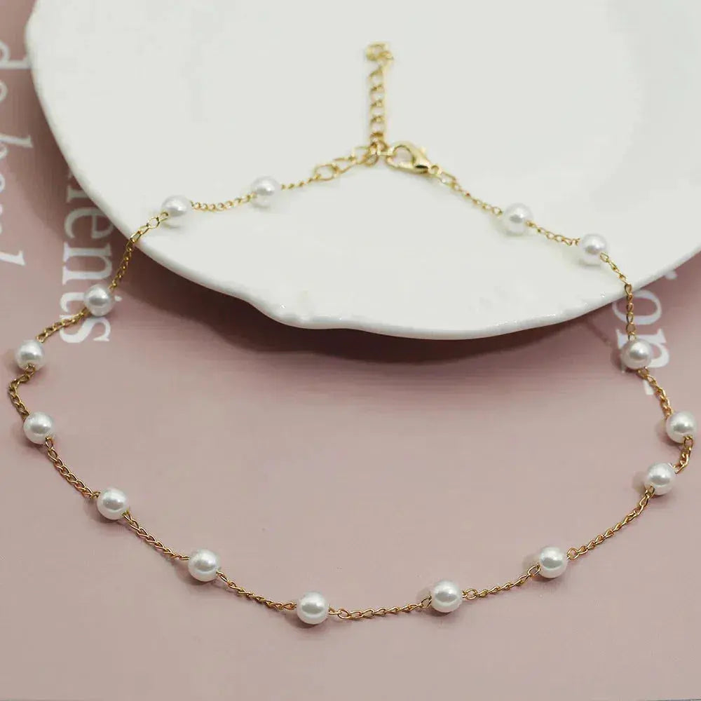 Collana di Perle in Tonalità Oro