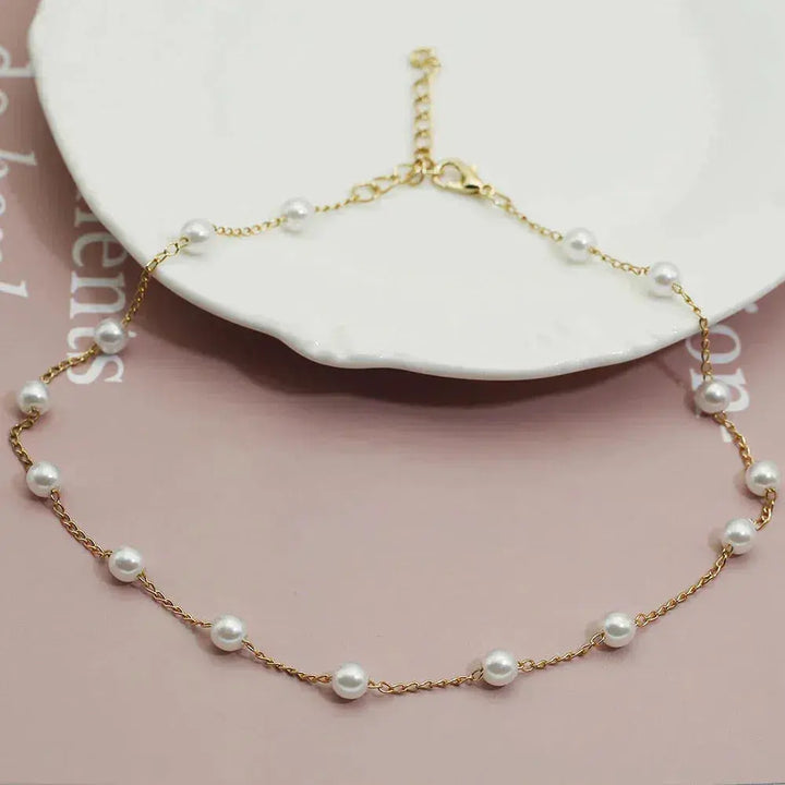 Collana di Perle in Tonalità Oro