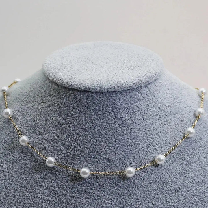 Collana di Perle in Tonalità Oro