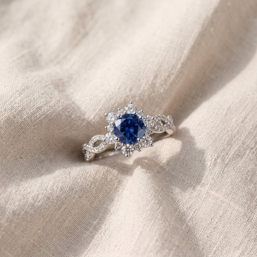 Anello fiore argentato con cristalli blu