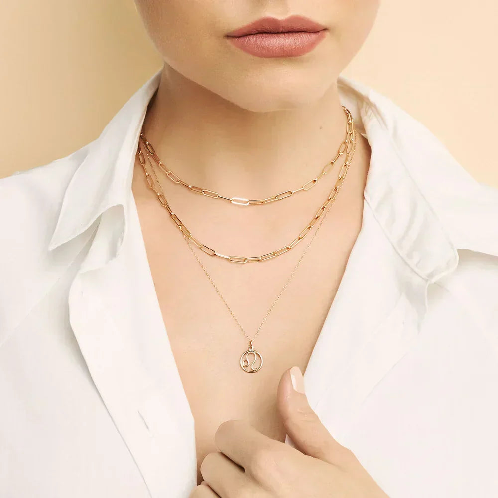 Collana dorata con segno zodiacale