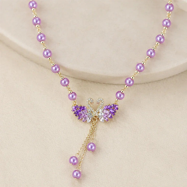 Collana iconica con cigno viola