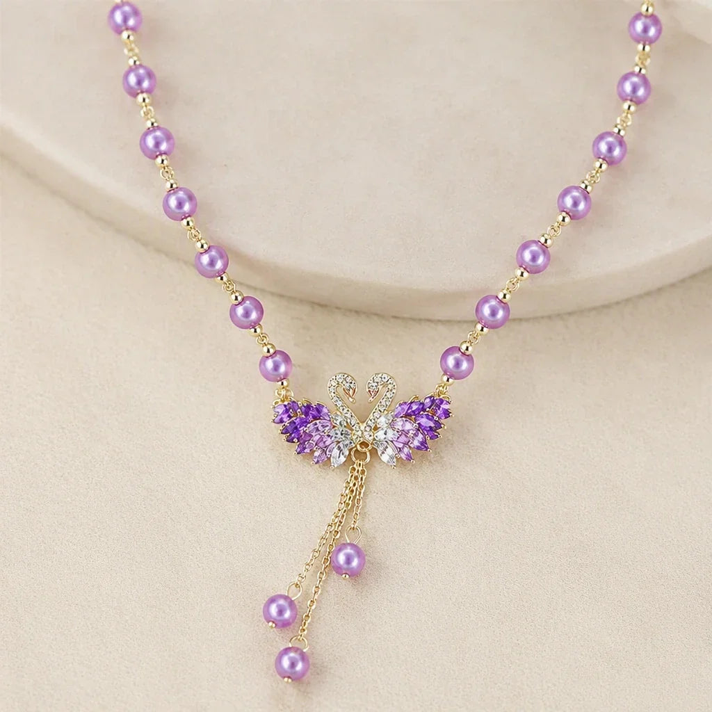 Collana iconica con cigno viola