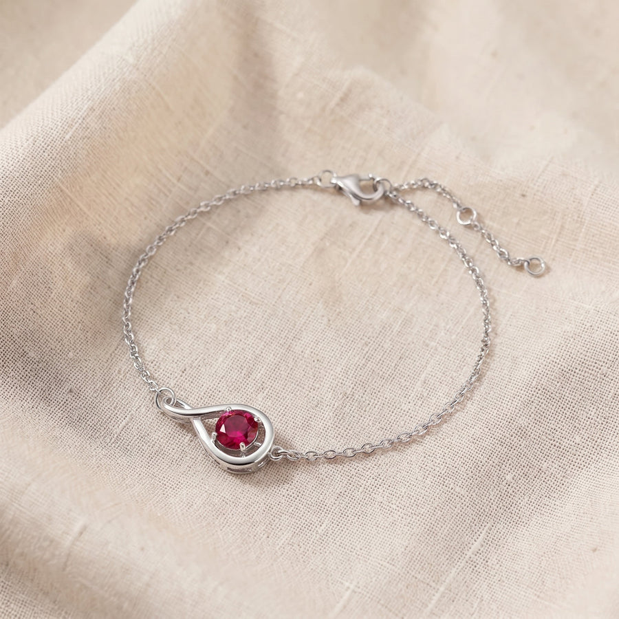 Bracciale infinito argentato rosso rubino