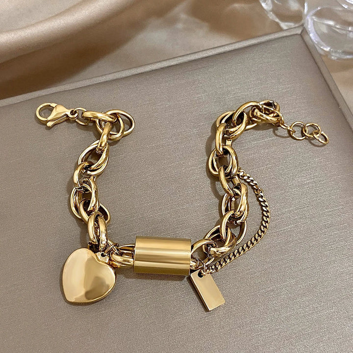 Bracciale massiccio con cuore | Oro