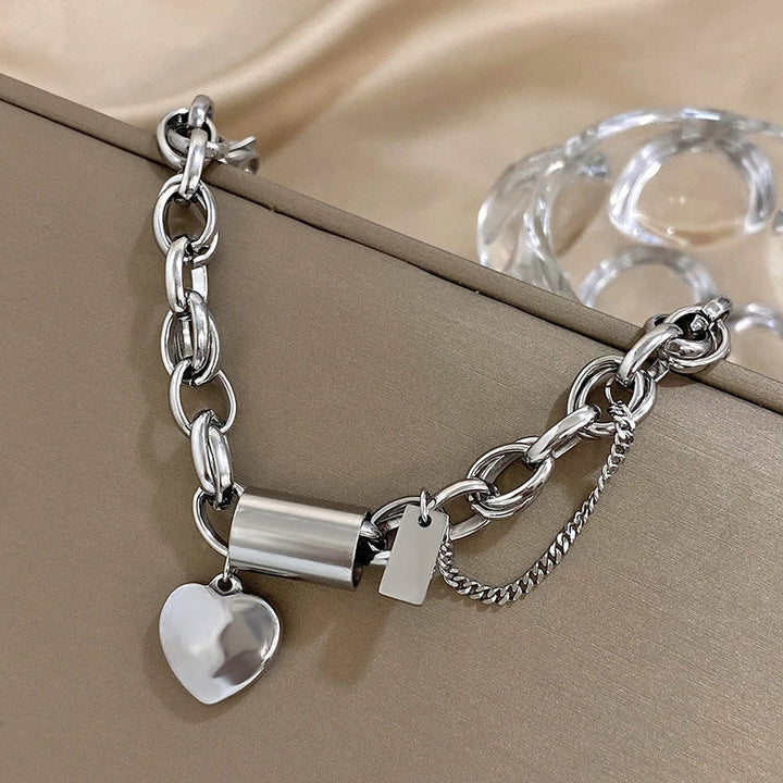 Bracciale massiccio con cuore | Oro