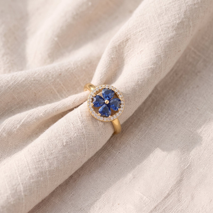 Anello rotante dorato con cuori blu