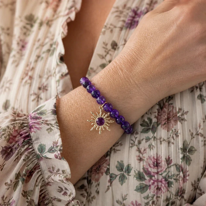 Bracciale in perle di ametista con motivo solare
