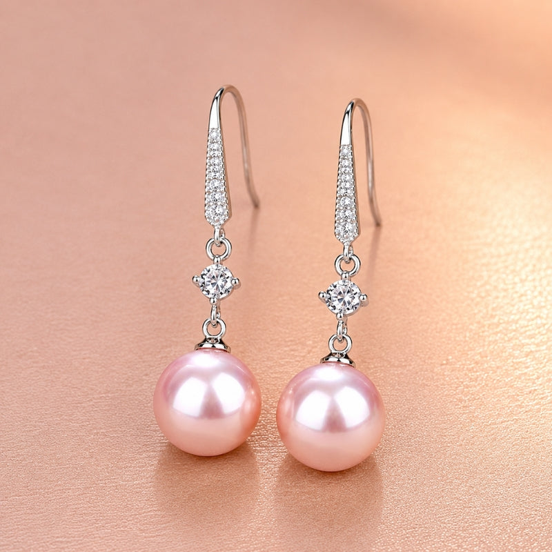Orecchini con perla e cristallo rosa dorati