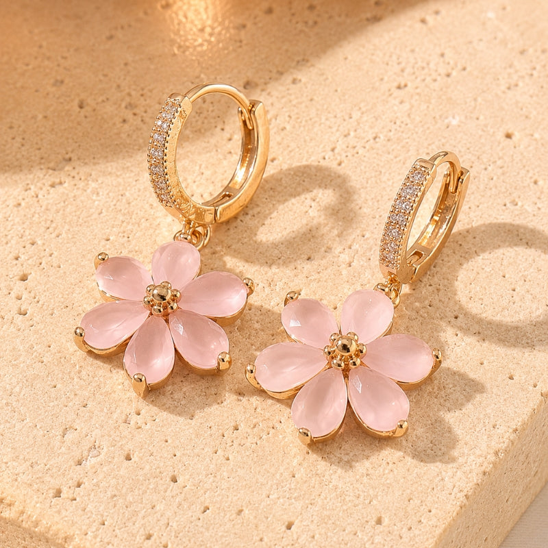 Orecchini a cerchio con fiore rosa pendente dorati