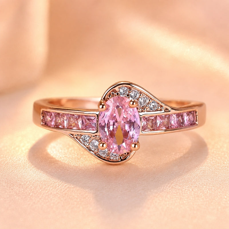 Anello dorato con grande cristallo rosa