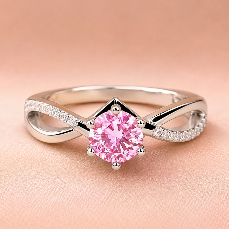 Anello argentato con cristallo rosa a sei griffe