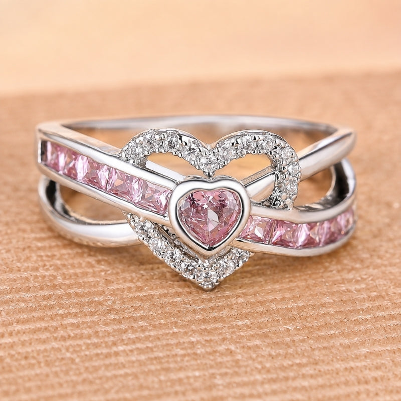 Anello argentato con cuore rosa brillante