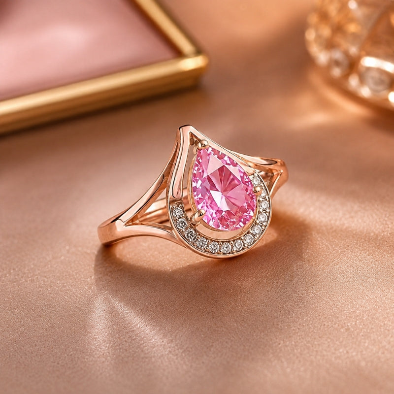 Anello oro rosa con pietra rosa a goccia