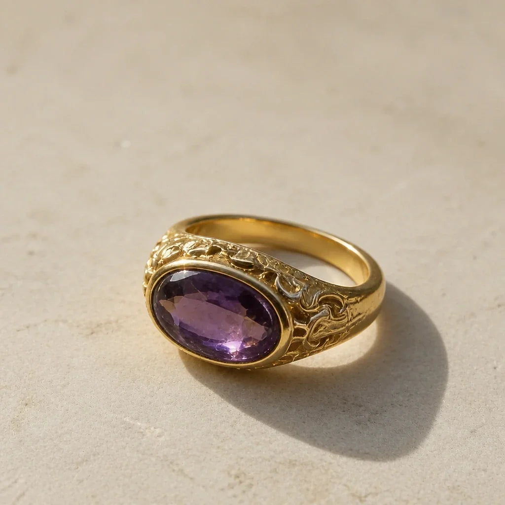 Anello vintage dorato con cristallo viola
