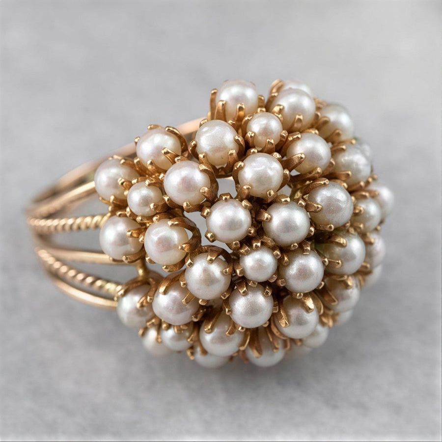 Anello classico dorato con perla