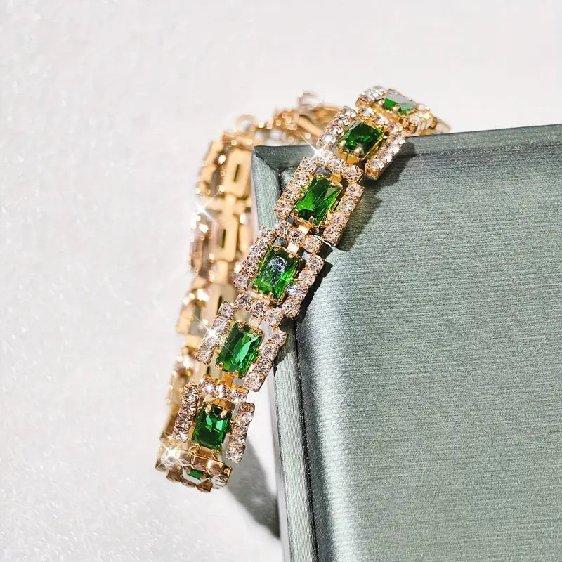 Bracciale dorato sgargiante verde smeraldo