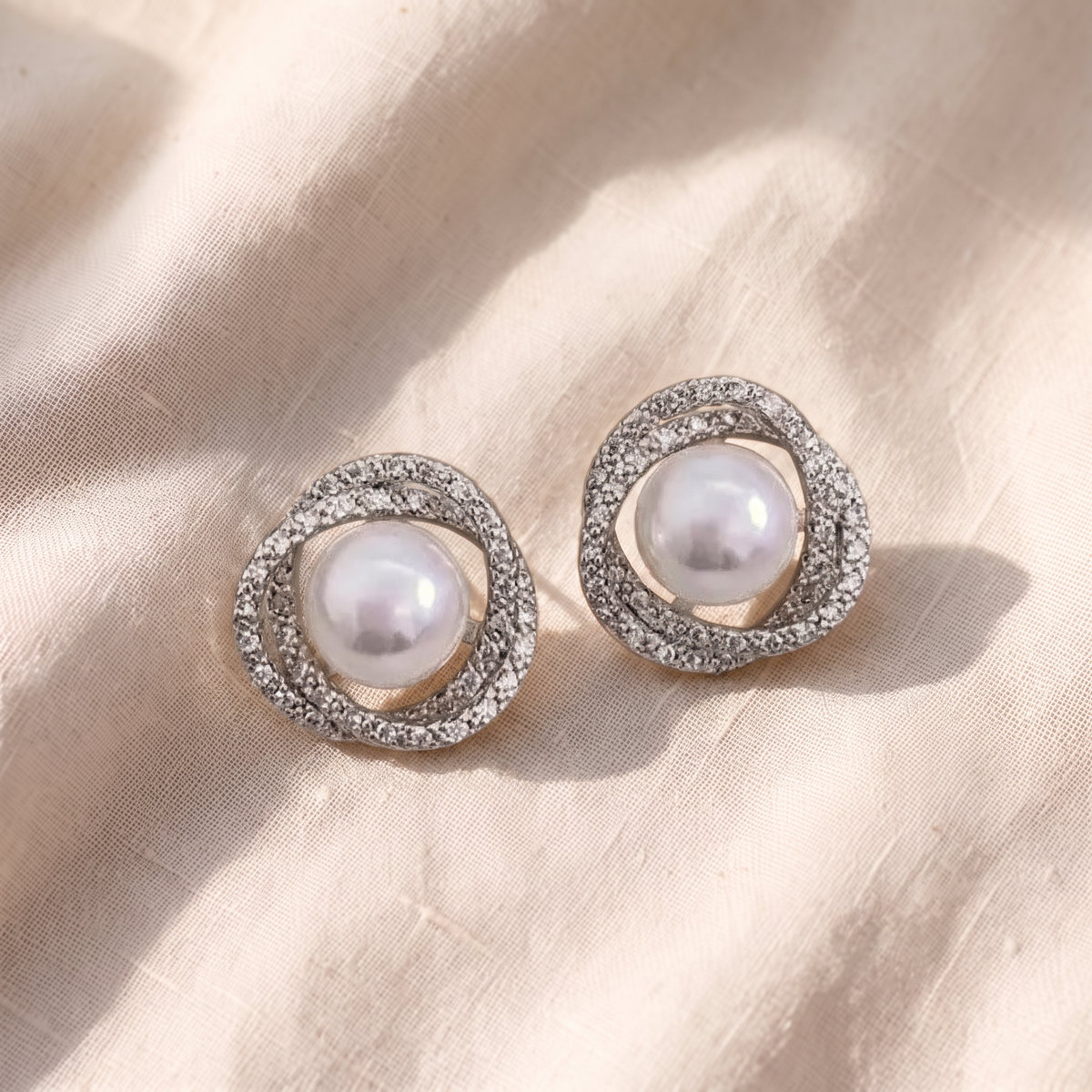 Orecchini a spirale con perla