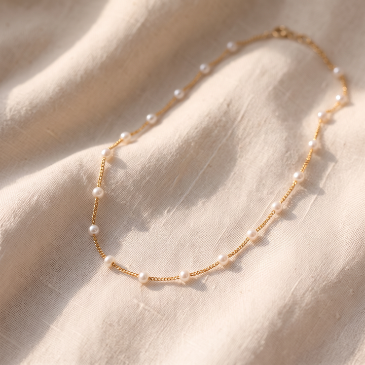 Collana di Perle in Tonalità Oro