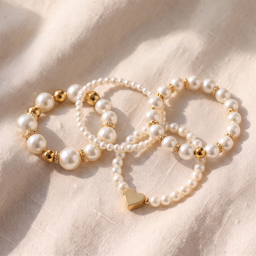 Set Elegante di 4 Braccialetti in Perle