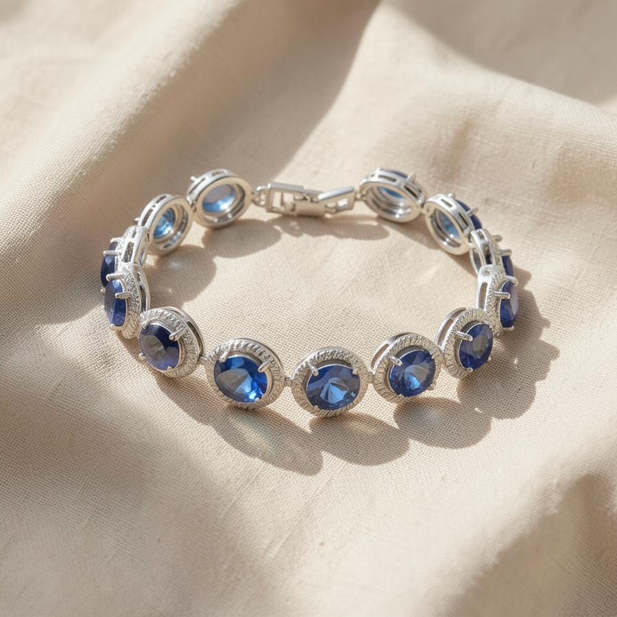 Bracciale argentato con pietra blu zaffiro rotonda