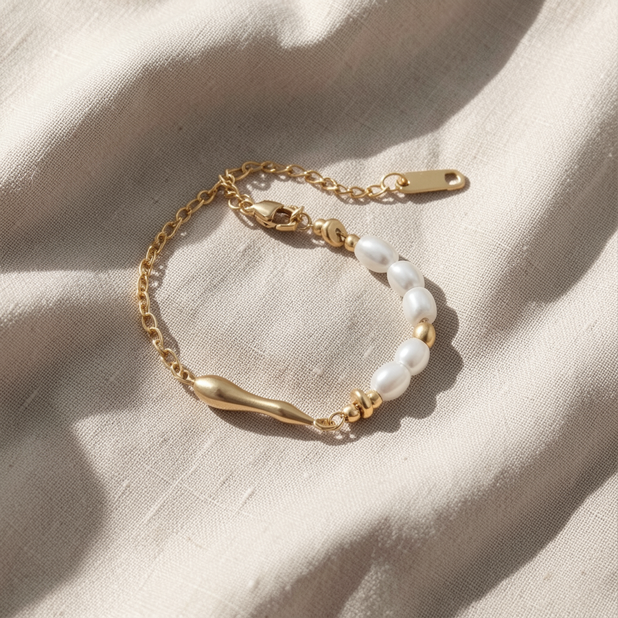 Bracciale dorato di perle Stella