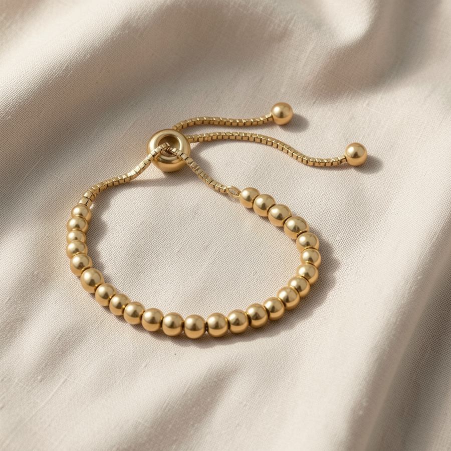 Bracciale dorato con perline